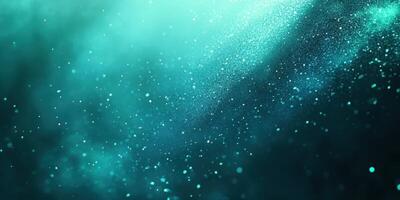 Particles of light drift in a tranquil aqua haze during a magical evening photo