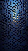 Intricate patterns created by light shining through perforated metal in a dim setting photo