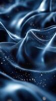 Elegant flowing fabric with shimmering particles under soft light in a tranquil setting photo