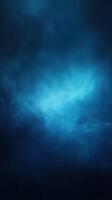 Mysterious blue haze filling a dark void, evoking a sense of wonder and exploration in the depths of the unknown photo