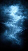 Dark ocean waves illuminated by a mysterious light at night creating an ethereal ambiance on a tranquil sea photo
