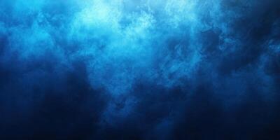 Deep blue hues swirl in a mesmerizing underwater world captured in a tranquil and serene ocean environment photo