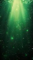 Light streams through green water creating a magical underwater atmosphere in a tranquil aquatic scene photo