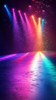 Colorful stage lights illuminating a dance floor at a nighttime event in an urban venue photo