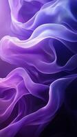 Colorful flowing fabric creates an abstract design with purple and lavender hues photo