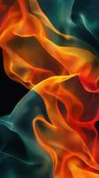 Colorful flowing fabric creates a dynamic visual experience with vibrant hues of orange and blue photo