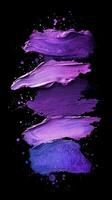 Striking arrangement of purple paint strokes against a black background highlighting artistic texture and color photo
