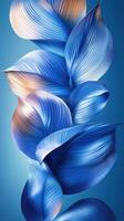 Vibrant blue abstract leaves intertwined against a smooth gradient background photo