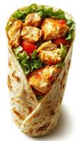Delicious chicken wrap with fresh vegetables garnished with sauce ready to be enjoyed photo