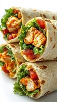 Flavorful chicken wraps with fresh vegetables are perfect for a quick lunch photo
