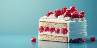 Delicious raspberry cream cake with layers of fluffy sponge and whipped topping on a blue background photo