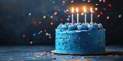 Colorful birthday cake with candles illuminated and confetti scattered on a festive background photo