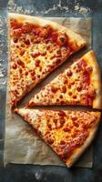 Delicious cheese pizza slices on parchment paper ready to be enjoyed for a casual meal photo