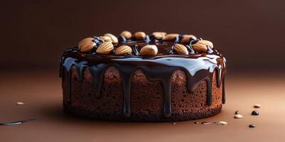 Rich chocolate cake topped with almonds and glossy ganache displayed on a dark surface photo