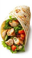 Delicious grilled chicken wrap filled with fresh vegetables and herbs for a healthy meal option photo