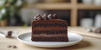 Delicious chocolate cake slice on a white plate with creamy frosting in a cozy kitchen setting photo