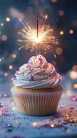 Delightful cupcake with sparkling candle showcases celebration spirit in a festive atmosphere photo