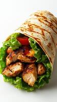 Grilled chicken wrap filled with fresh vegetables and crisp lettuce prepared with care photo