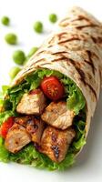 Grilled chicken wrap filled with fresh ingredients and cherry tomatoes at a modern food setting photo
