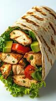 Freshly made chicken wrap with vegetables and grilled tortilla for a healthy meal option photo