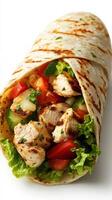 Delicious chicken wrap with fresh vegetables and tortillas prepared in a bright kitchen setting photo