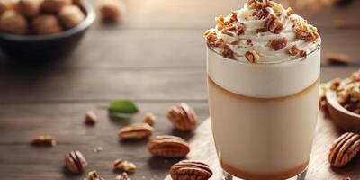 Creamy beverage topped with whipped cream and nuts on a rustic wooden table with a warm ambiance photo