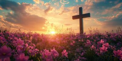 Landscape with cross and vibrant flowers at sunset creating a serene atmosphere photo