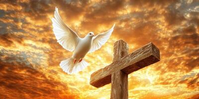 Dove soaring above a wooden cross at sunset creates a powerful symbol of peace and spirituality in a serene sky photo