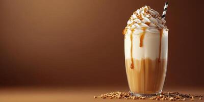 Creamy caramel frappuccino topped with whipped cream and chocolate drizzle in a cozy cafe setting photo