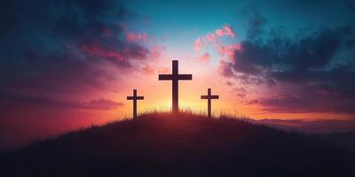 Crosses silhouetted against a vibrant sunset in a tranquil landscape expressing peace and reflection photo