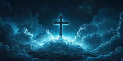 Cross illuminated in a mystical night sky filled with clouds and stars creating a serene spiritual atmosphere photo