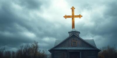 Wooden church with a golden cross under a cloudy sky in a rural setting during twilight photo