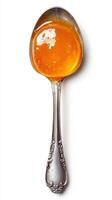 Silver spoon filled with golden honey on white background captures the essence of natural sweetness and culinary delight photo