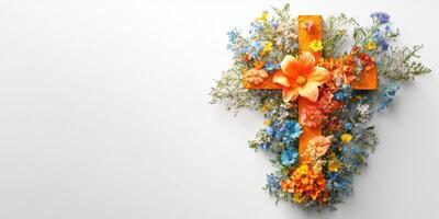 Vibrant floral cross arrangement symbolizing faith and renewal in a serene setting photo