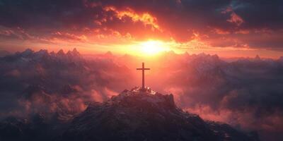 Cross on mountain peak at sunset surrounded by dramatic clouds and rugged terrain photo