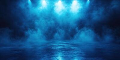 Stage illuminated by blue light with a misty background creating a dramatic atmosphere for a performance or event photo