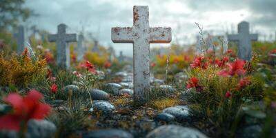 Mysterious graveyard with weathered crosses surrounded by vibrant flowers under a cloudy sky photo