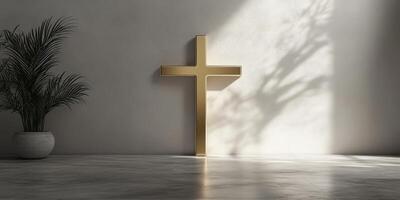 Modern gold cross displayed against a minimalist wall with shadow play from a nearby plant in a serene indoor setting photo