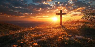 Sunset view with a wooden cross on a hill surrounded by flowers and a colorful sky at dusk photo
