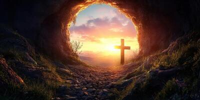 Sunrise illuminates a cave with a cross symbolizing hope and renewal in a serene landscape photo