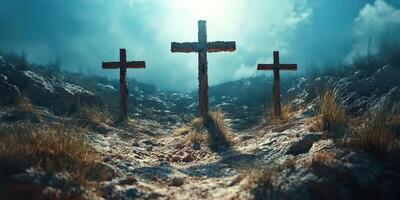 Three crosses stand on a rocky landscape illuminated by a dramatic sky at dawn photo