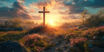 Cross in a tranquil meadow at sunset with colorful flowers and a vibrant sky photo