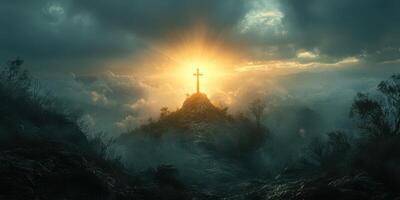 Light breaks through clouds to illuminate a cross on a hilltop at dawn photo