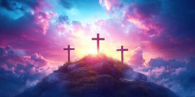 Sunset over three crosses on a hill surrounded by clouds and colorful sky photo