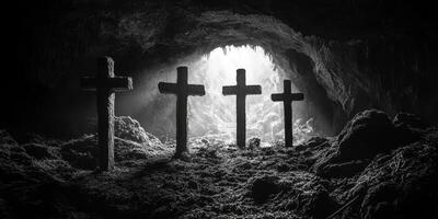 Crosses stand in a dark cave illuminated by soft light from the entrance, creating a somber yet serene atmosphere photo