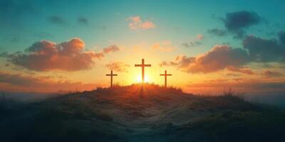 Three crosses silhouetted against a vibrant sunset sky symbolizing faith and hope on a serene hilltop photo