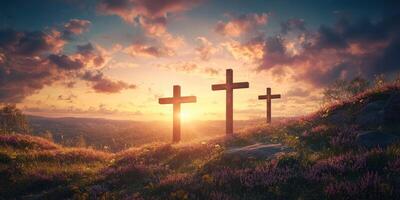 Sunset landscape featuring wooden crosses on a hillside with blooming flowers in the foreground photo