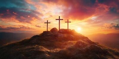 Sunset view of three crosses on a hilltop with dramatic clouds highlighting the horizon photo