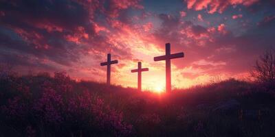 Crosses silhouetted against a vibrant sunset with clouds in a serene landscape photo
