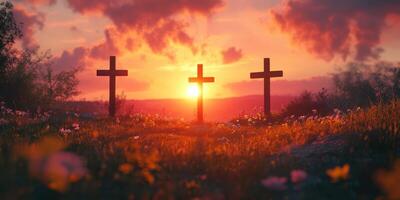 Sunset casts warm light on three wooden crosses in a serene, floral landscape photo